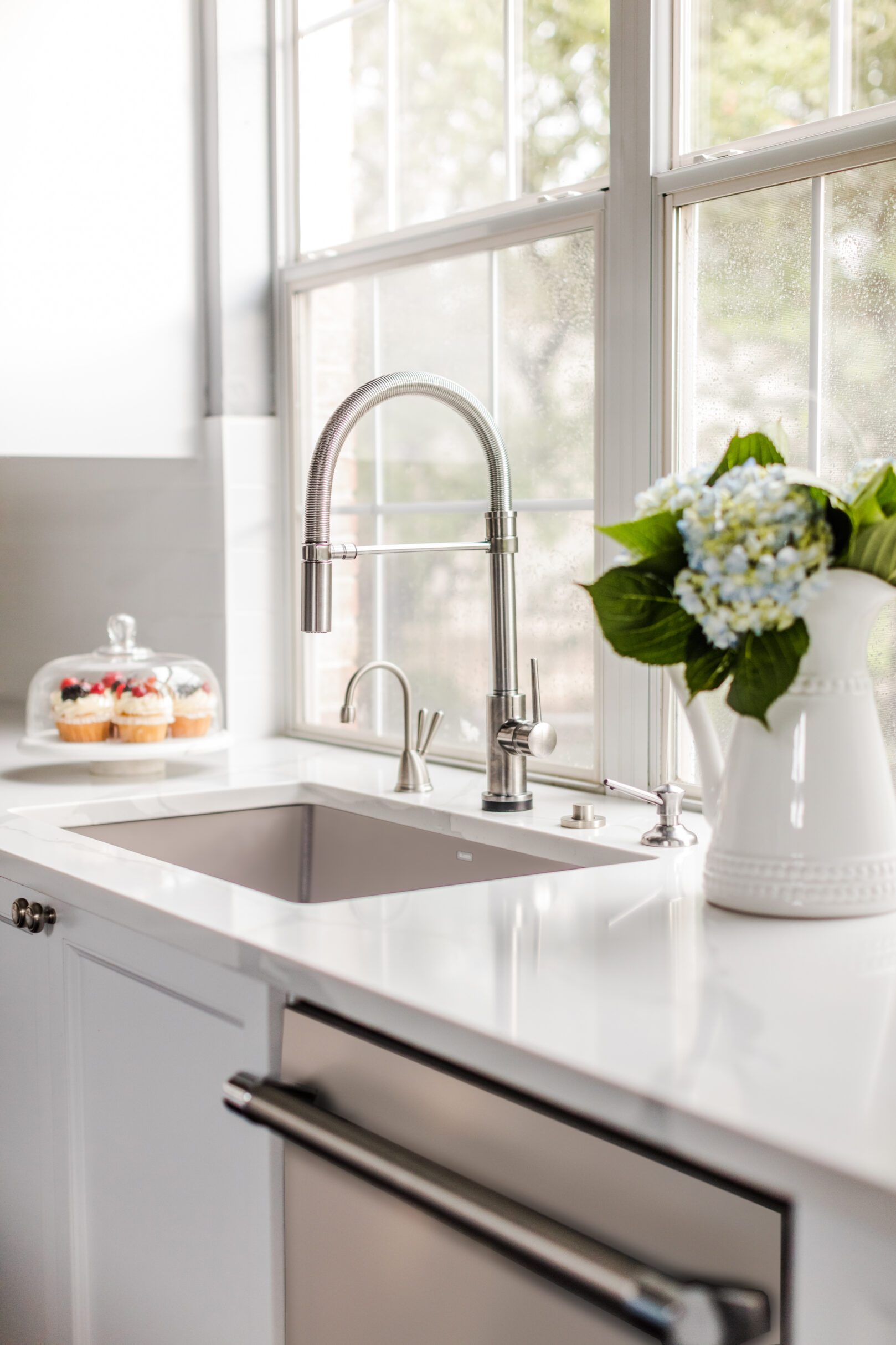 lakeway austin luxury white kitchen remodel chrome faucet