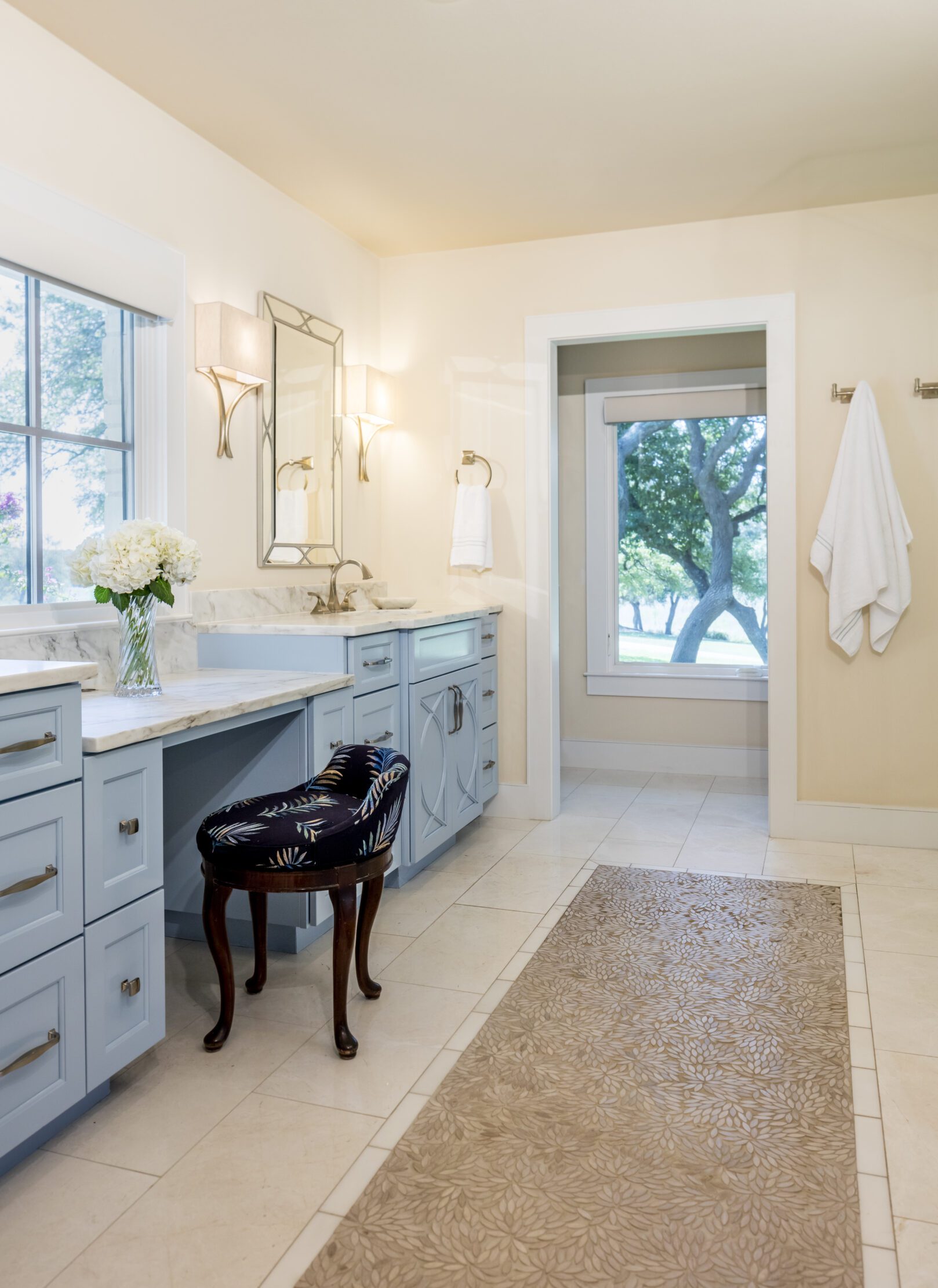 modern ranch home austin luxury bathroom remodel blue shaker cabinets