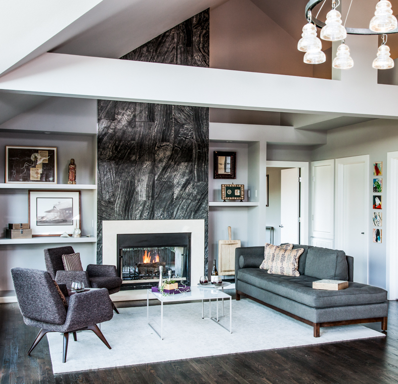 westlake austin interior design midcentury luxury living room black stone fireplace
