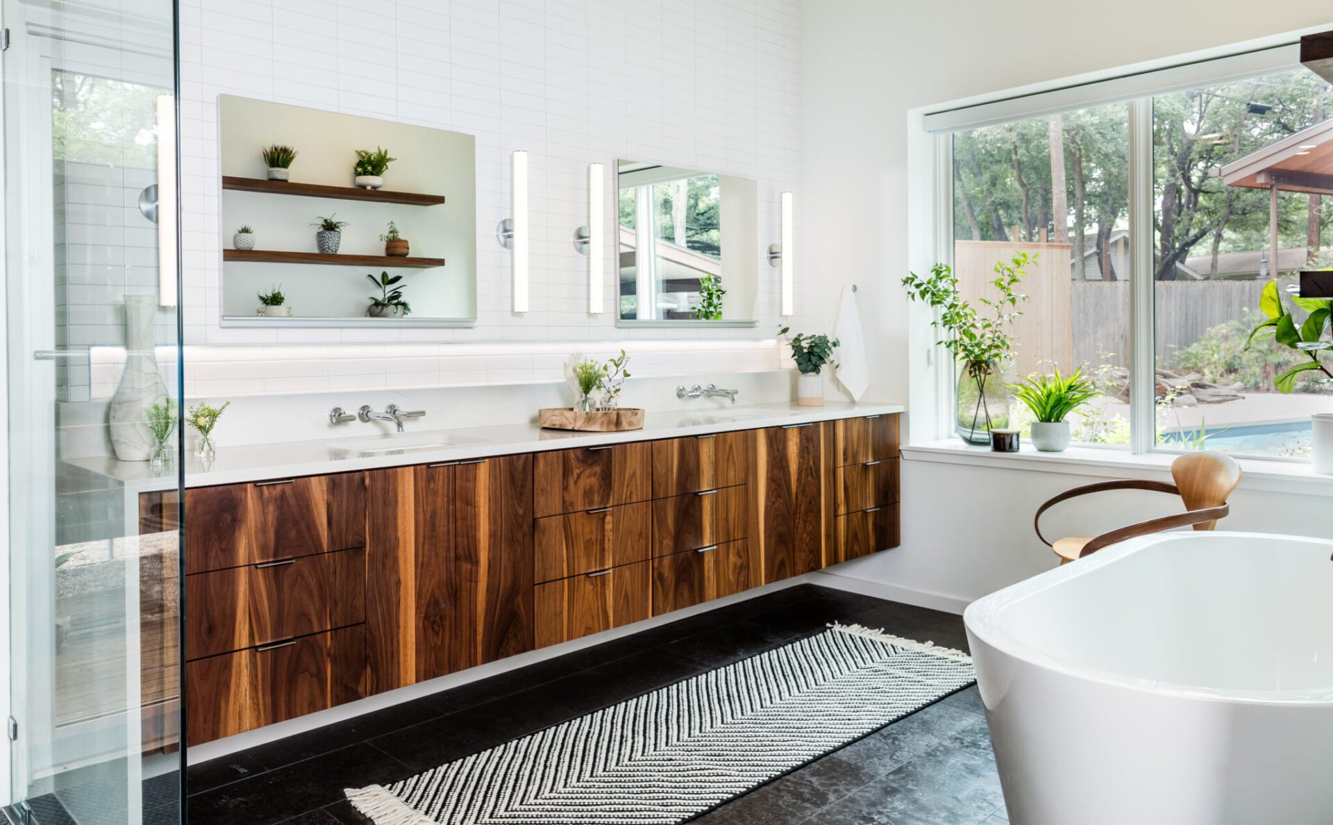 austin organic modern floating vanity natural wood walnut cabinets luxury bathroom interior design